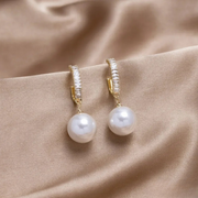 Elegante Damenohrringe mit Perlen und Zirkonen