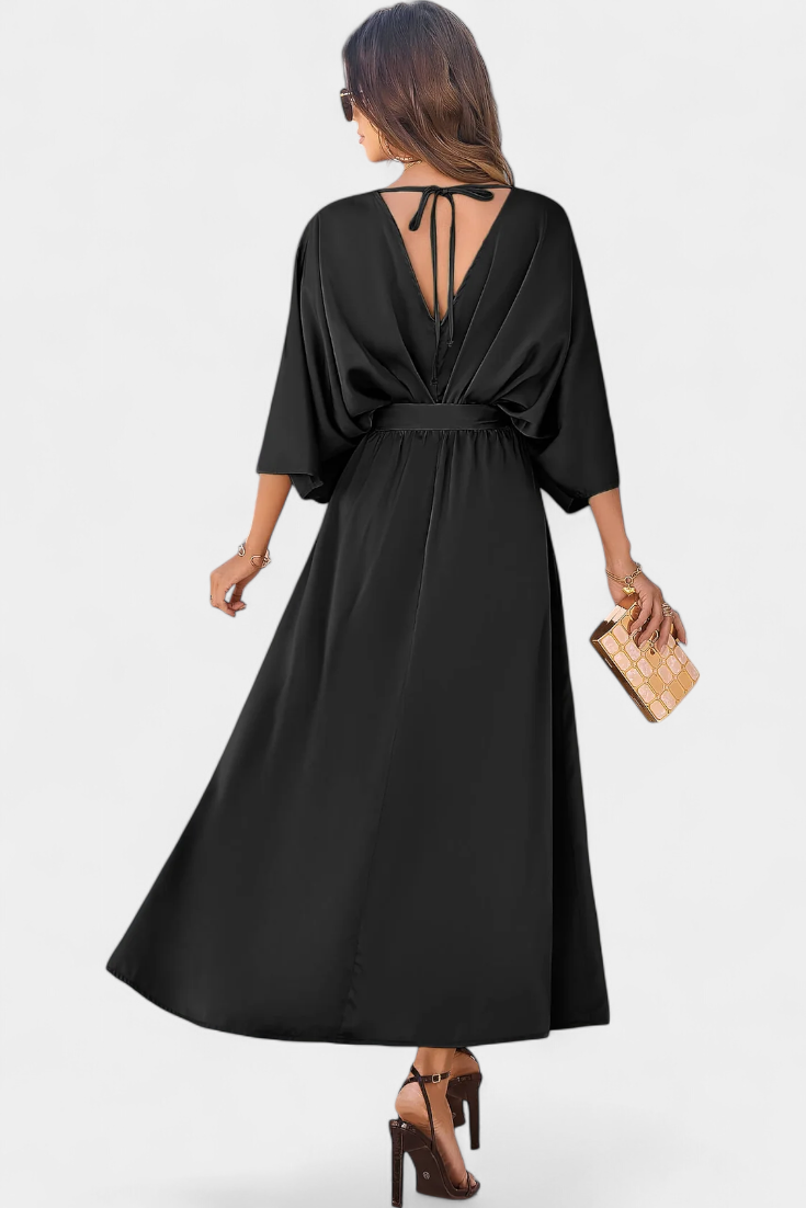 Elegantes Kleid von Milly mit Schleife und Öffnung