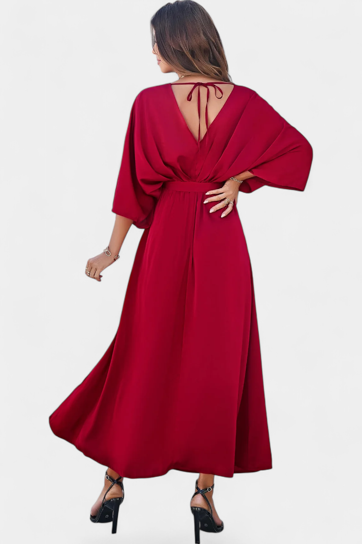 Elegantes Kleid von Milly mit Schleife und Öffnung