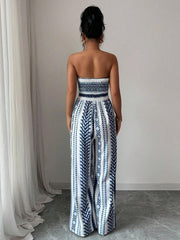 Ursula | Geometrischer Jumpsuit mit Halter-Ausschnitt und Seitenschlitz