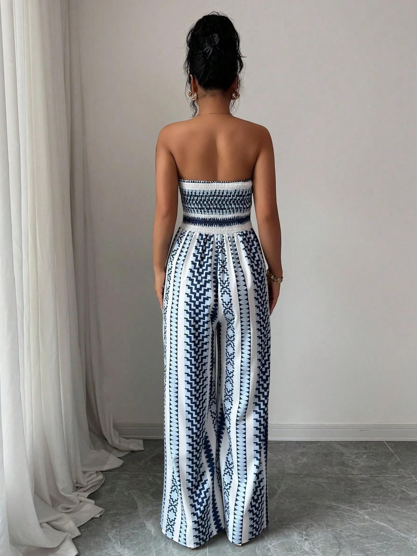 Ursula | Geometrischer Jumpsuit mit Halter-Ausschnitt und Seitenschlitz