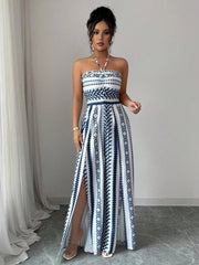 Ursula | Geometrischer Jumpsuit mit Halter-Ausschnitt und Seitenschlitz