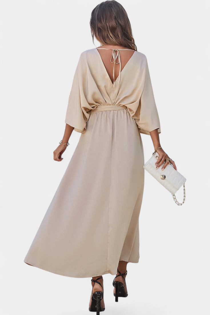Elegantes Kleid von Milly mit Schleife und Öffnung